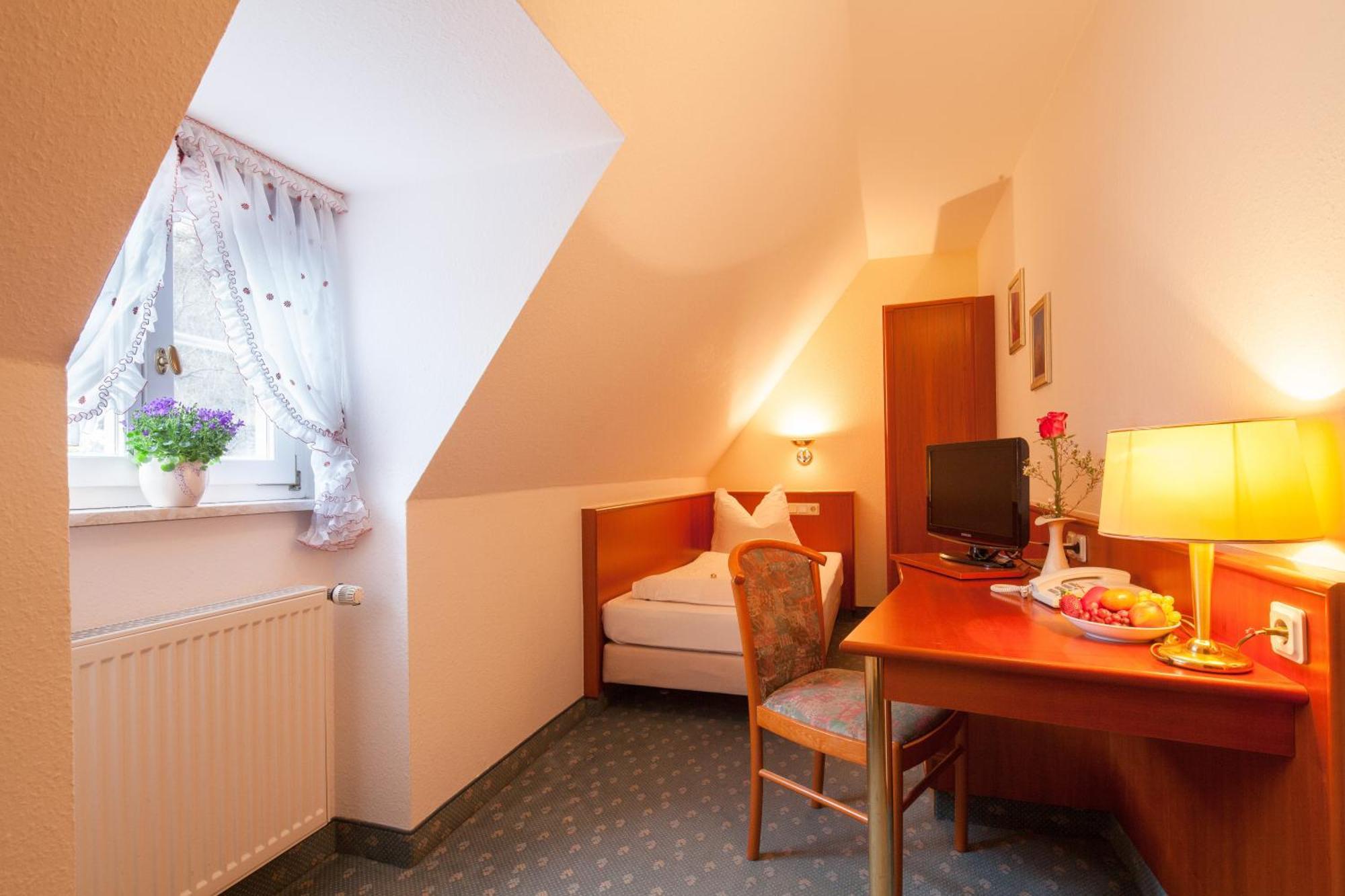 Hotel Domschatz Кведлінбург Номер фото